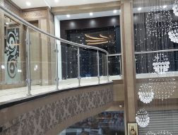 2" dia Stainless Steel Round Top Rail and 1 ½" dia SS Balustrade with 10 mm Clear Tempered Glass